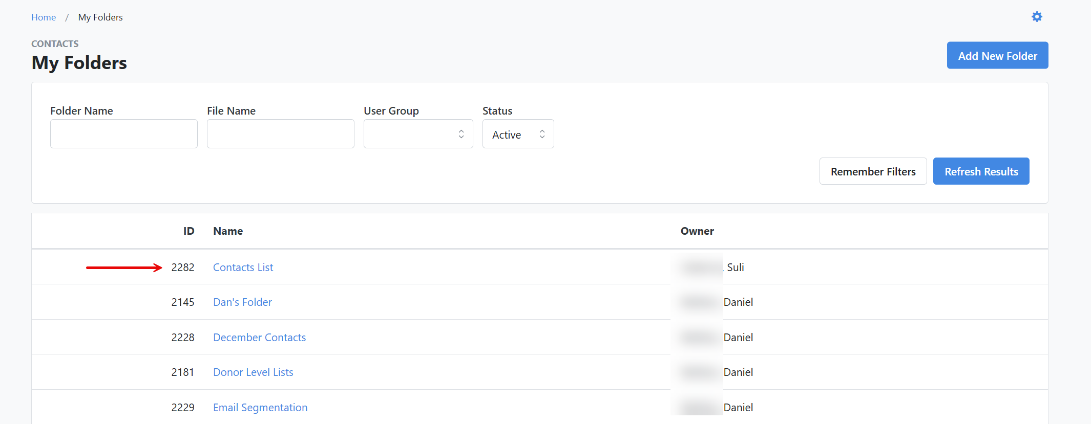 How do I manage user access for a shared folder?